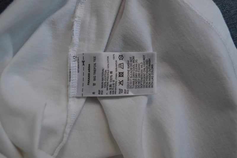 Adidas Originals – Damen "Big Trefoil" T-Shirt in Weiß / Pastellrosa – Gr. S (Oversized / Gr. 10)