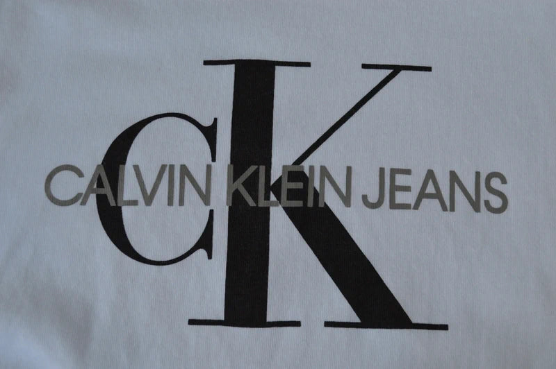 Calvin Klein Jeans Monogram Logo T-Shirt in Weiß – Gr. M