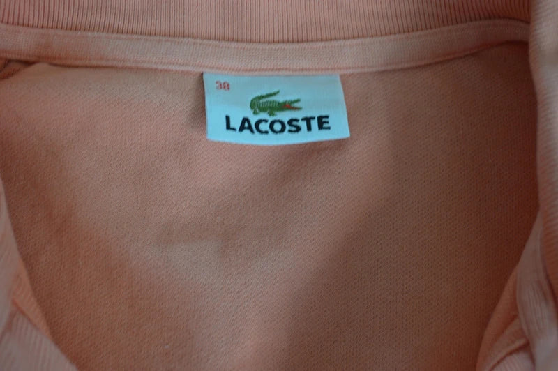 Lacoste – Damen Piqué-Stretch Poloshirt in Apricot  Pfirsich – Gr. 38 (SM)