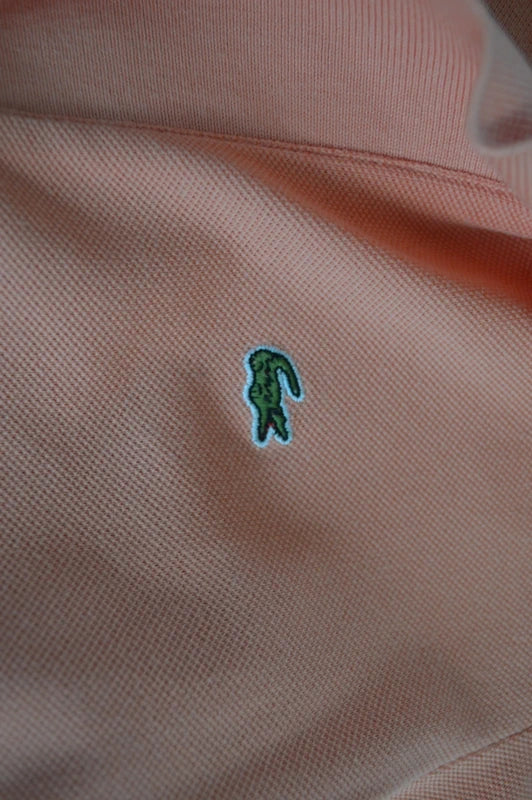 Lacoste – Damen Piqué-Stretch Poloshirt in Apricot  Pfirsich – Gr. 38 (SM)