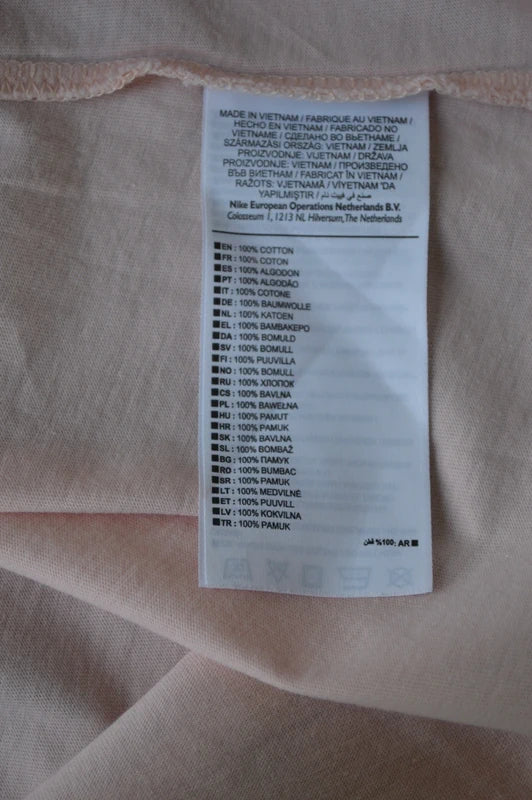 Nike Sportswear Essential Muscle Tank Top in Hellrosa mit Gold-Logo – Gr. XL (flexibel)