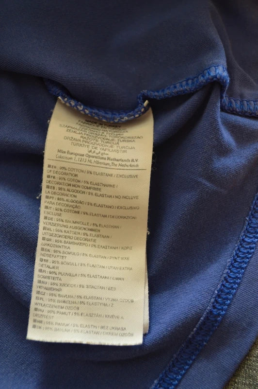 Nike – Damen V-Neck Top "The Athletic Dept." in Lavendelblau – Gr. XL (D 48/50 – Guter Zustand)