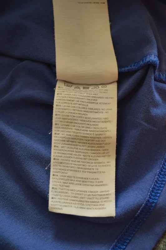 Nike – Damen V-Neck Top "The Athletic Dept." in Lavendelblau – Gr. XL (D 48/50 – Guter Zustand)