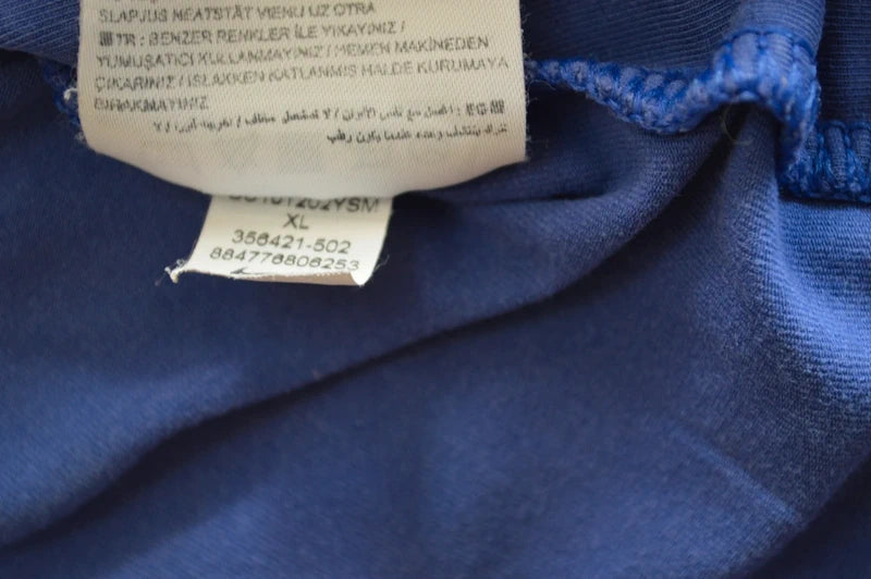Nike – Damen V-Neck Top "The Athletic Dept." in Lavendelblau – Gr. XL (D 48/50 – Guter Zustand)
