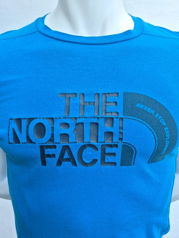 The North Face Herren T-Shirt „Never Stop Exploring“ – Blau – Gr. S (Guter Zustand mit kl. Makel)