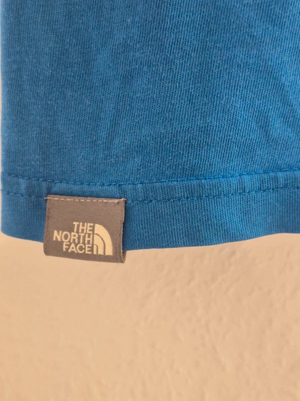 The North Face Herren T-Shirt „Never Stop Exploring“ – Blau – Gr. S (Guter Zustand mit kl. Makel)